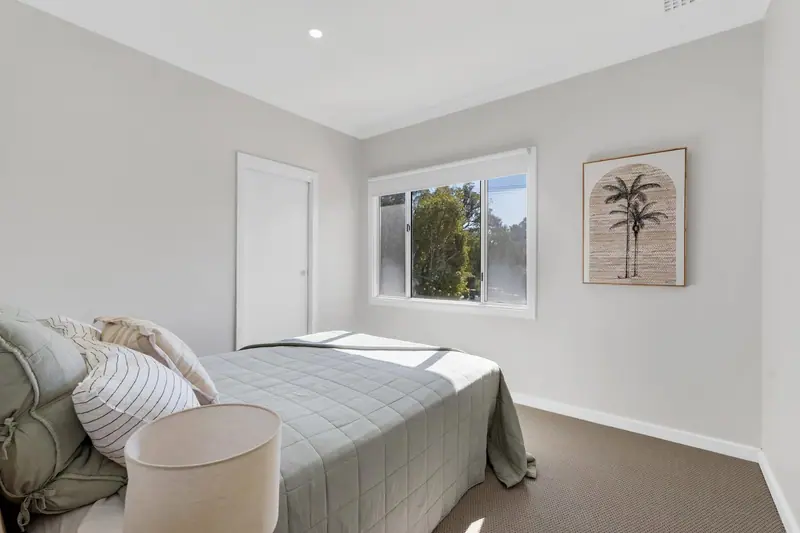 Main bedroom with new window, carpet and cornice