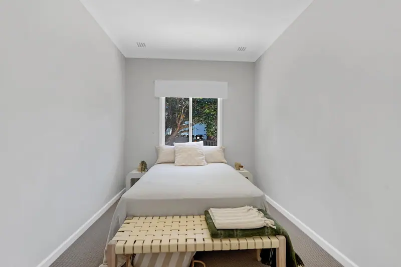 Bedroom with fresh paint, carpet and new window