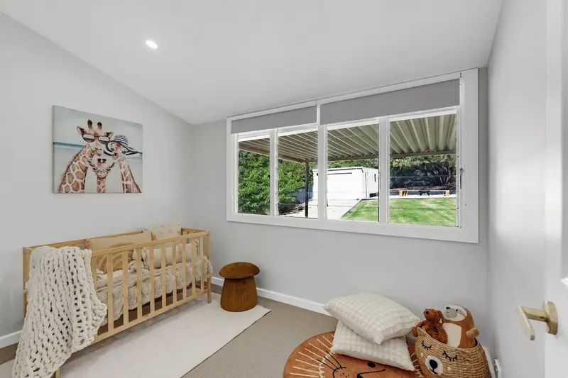 Nursery with new louvre windows overlooking the backyard